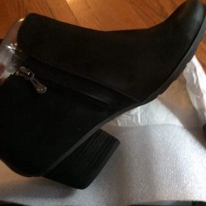 Size 10 booties. Never worn.